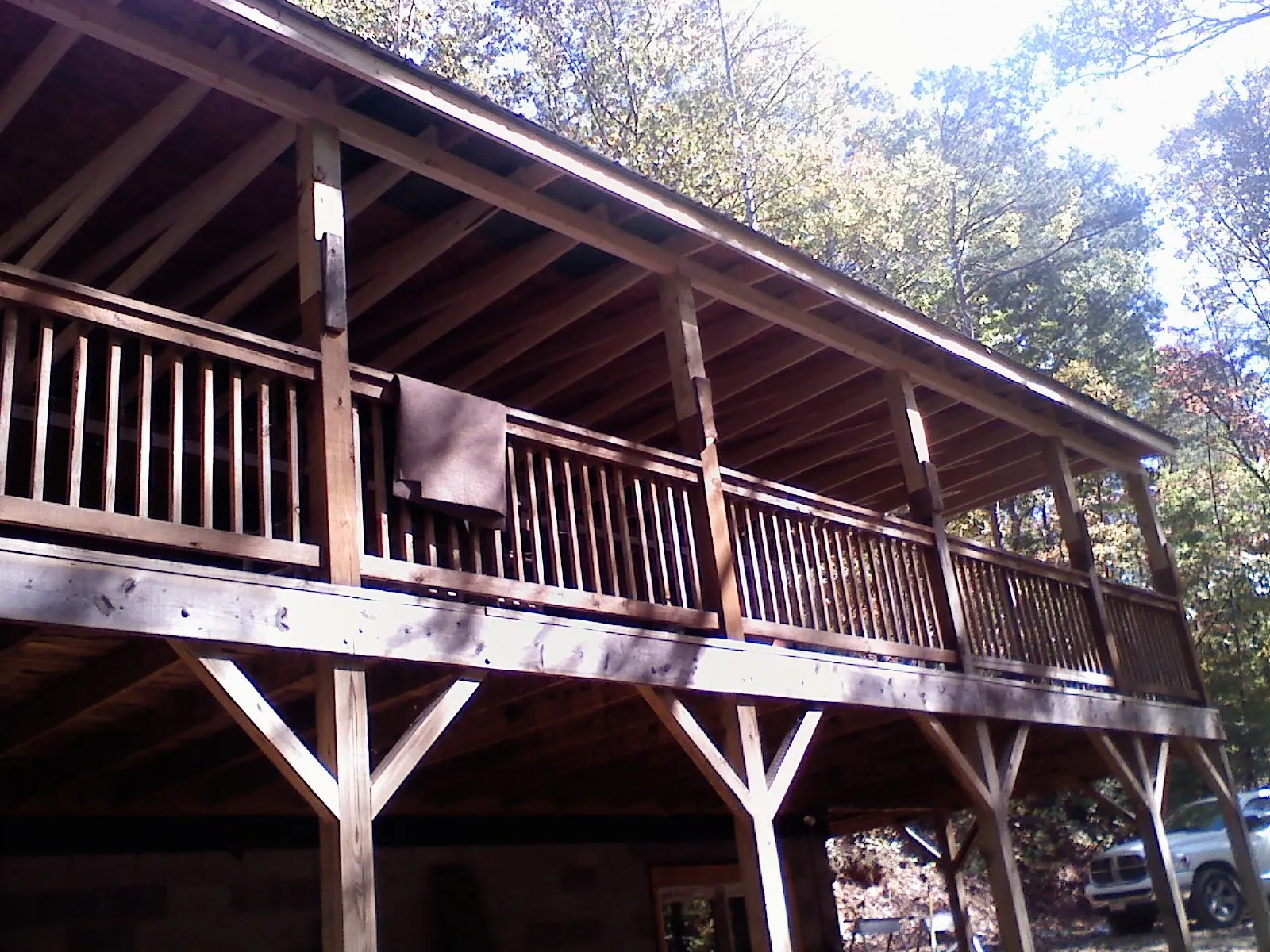 Timber framing under a new elevated porch and deck — Roof Leak Repair in Johnson by Roofing Brothers
